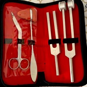 Tuning forks, reflex hammer and medical scissors!